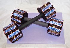 several bars of snickkers are stacked on top of each other in the shape of a triangle