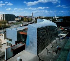 an aerial view of a building in the city