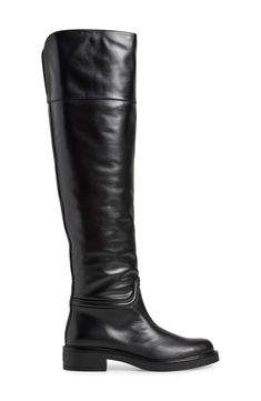 A classic riding boot takes a dramatic turn with smooth leather composition and an over-the-knee silhouette. 1 3/4" heel 20 1/2" shaft; 14" calf circumference Pull-on style Leather upper/synthetic lining and sole Made in Spain Elegant Knee-high Boots With Leather Sole, Classic Knee-high Boots In Calf Leather, Classic Wide Calf Knee-high Boots In Calf Leather, Classic Calf Leather Wide Calf Knee-high Boots, Classic Leather-lined Knee-high Boots For Formal Occasions, Classic Knee-high Boots With Leather Sole For Riding, Classic Wide Calf Knee-high Boots For Riding, Riding Knee-high Boots With Leather Sole, Elegant Over The Knee Calf Leather Boots