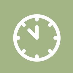 a white clock on a green background