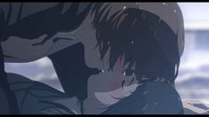 an anime scene with two people kissing and one person holding his head to the side