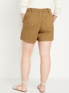 elasticized back waist belt loops zip fly front utility pockets back patch pockets pull-on style sits at belly button relaxed hip and thigh 5" inseam models are approx.  5'9" and wear sizes s (4), l (12), and xl (18)machine wash according to the care instruction label Khaki Relaxed Fit High Waist Shorts, High-waist Utility Shorts With Hip Pockets, Khaki High-waisted Shorts With Belt Loops, Khaki High-waist Relaxed Fit Shorts, Khaki Relaxed Fit Knee-length Shorts, Utility Pockets, Jack Black, Back Patch, Chino Shorts