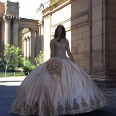 Radiate elegance and sophistication on your special day with this Sweetheart Embroidery Satin Gold Quinceanera Dress. This dress is crafted from luxurious satin fabric and boasts intricate embroidery and appliqued embellishments that add depth and regal charm. The rich gold hue enhances the overall opulence of the design, making it a show-stopping choice for your quinceanera. The strapless sweetheart neckline adds a touch of romance, beautifully framing your shoulders and décolletage. The corset Maroon Quinceanera Dresses, Gold Quinceanera Dresses, Green Satin Prom Dress, Burgundy Quinceanera Dresses, Burgundy Wedding Dress, Vestido Charro, Quinceanera Dresses Gold, Long Sleeve Ball Gowns, Quinceanera Dresses Pink