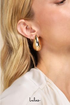 Your exceptional taste is sure to wow with accessories like the Lulus Bold Expression Gold Chunky Teardrop Statement Earrings! Shiny, gold-toned metal shapes these eye-catching statement earrings that have a puffy, teardrop-shaped silhouette with a stunning oversized profile. Post backs. Earrings measure 1. 75" long and 1" wide. Man Made Materials. Imported. Lulus | Bold Expression Gold Chunky Teardrop Statement Earrings. Lulu Fashion, Earrings Teardrop, Gold Statement Earrings, Accessories Jewelry Earrings, Real Gold, Gold Tone Metal, Wedding Shop, Statement Earrings, Jewelry Accessories