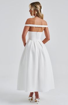 The epitome of elegance, Lanetta features a plunge bardot neckline with elasticated back strap bringing stylish flair. Falling to an effortlessly chic midi length, the design has a full, box pleated skirt and looks amazing paired with pointed heels and soft glam. 



Colour: Ivory.

Premium non-stretch crepe.

Fully lined.

Plunge bardot neckline.

Shaped underbust seam.

Full, box pleated skirt.

Elasticated back strap.

Invisible zipper fastening.

Midi length.

 Size: XS, S, M, L, XL, XXL Box Pleated Skirt, Split Long Dress, Bardot Neckline, Box Pleat Skirt, Loungewear Dresses, Maxi Dress Sale, Soft Glam, Pointed Heels, Maxi Dress Navy