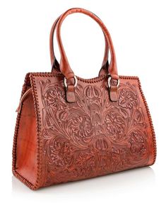 Meet the Carlotta, a gorgeous large leather tote bag to fit all of your things. This stunning tooled leather purse features beautiful floral designs and high quality everything. Braided leather edges add durability and designer looks. Features a spacious interior with four total pockets, two open and two with zippers.   Ideal for daily use as a laptop bag, work purse, or for your wallet and essentials.Part of the Mauzari signature line which is our highest quality production.  Thick leather, hig Embossed Double Handle Shoulder Bag For Everyday Use, Everyday Double Handle Embossed Shoulder Bag, Embossed Tote Bag For Everyday Use, Everyday Embossed Tote Satchel, Everyday Embossed Tote Bag, Brown Hand Tooled Shoulder Bag For Everyday Use, Hand-tooled Handheld Brown Shoulder Bag, Hand Tooled Brown Handheld Shoulder Bag, Hand Tooled Tote Bag For Daily Use