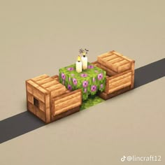 a low poly model of a table and couch with flowers on it in minecraft