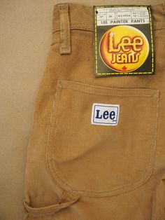 Unworn, originating from the archive of a jeans shop that closed down late last century.  Vintage Lee Painter Pants from the 70s in a light brown wide-wale corduroy.  Made in Canada from 84% cotton and 16% polyester They close with a Lightning zipper and snap button. Pockets in the front and back, hammer loop on the leg.  Waist: 72cm / 28.5'' Front rise: 30.5cm / 12'' Seat: 98cm / 38.5'' Inseam: 90cm / 35.5'' Label size W27 L36, equivalent within the range of a modern XS 70s Corduroy, Pull Up Pants, Painter Pants, Painters Pants, Lee Jeans, Pull Up, Label Sizes, Jeans Shop, Sweden