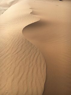 the sand is very thin and smooth in this desert scene, with no people on it