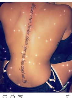 the back of a woman's body with words on it and stars in the background