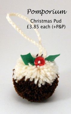 a close up of a christmas pudding on a white background with the words pomporium