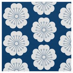 a blue and white flower pattern on fabric