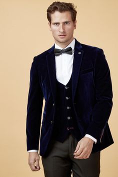 If you feel like trying something a little different at that upcoming black-tie event, give this opulent navy velvet blazer a go. Cut to a slim tailored fit, this lavish blazer is a classic that will see you through the seasons in style Features Slim fit Single-breasted Notch lapel Single back vent Four button cuff Single button fastening Complimentary pocket square Functional inside and outside pockets Style Tip | Style with a simple white shirt & black tie for a refined black tie look Composit Navy Velvet Suit, Stylish Blazers, Navy Suit Wedding, Wedding Blazers, Peaky Blinders Suit, Tweed Wedding Suits, Evening Suit, Black Suit Wedding, Double Breasted Waistcoat