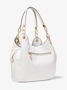 Our Lillie shoulder bag combines timeless glamour with everyday functionality. Designed in a slouchy shape and detailed with our signature hardware this carryall features a pebbled-leather exterior that opens to reveal two snap compartments and a secure center zip pocket. Count on it to tote your essentials with stylish ease. White Pebbled Leather Bag, Pebbled Leather Tote Shoulder Bag With Metal Hardware, Leather Bag With Grained Texture And Double Handle, Designer Bags With Grained Texture For Everyday Use, Michael Kors Leather Work Bag, Michael Kors Leather Bags For Work, Grained Texture Shoulder Bag, Leather Tote Bag With Grained Texture, White Pebbled Leather Bag With Gold-tone Hardware