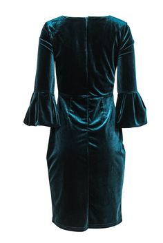 Go holiday haute couture with this festive frock from ABS Collections! The simple sheath dress is upgraded with billowy bell sleeves and super soft velvet in a rich dark teal hue. Perfect for wherever the season takes you! Whether you’re gathering around the table for Thanksgiving dinner or singing carols by the Christmas tree, pair this beauty with sparkly pumps and a bold red lip and you’ll be looking totally merry and bright! Size 6 Shell: 90% Polyester, 10% Spandex Lining: 92% Polyester, 8% Teal Velvet, Dark Teal, Thanksgiving Dinner, Soft Velvet, Bell Sleeve, Sheath Dress, Bell Sleeves, Singing, Velvet