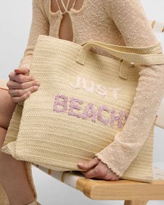 BTB Los Angeles straw and polyester tote bag with "Just Beachy" typographic     Flat shoulder straps, 7"L    Approx. 14"H x 17"W x 7"D    Spot clean    Imported Eco-friendly Cotton Straw Bag For Beach, Eco-friendly Straw Beach Bag With Bamboo Handle, Eco-friendly Straw Beach Bag With Top Carry Handle, Eco-friendly Straw Shoulder Beach Bag, Eco-friendly Handwoven Rattan Beach Bag, Straw Tote Bag, Straw Tote, Manolo Blahnik, Jimmy Choo