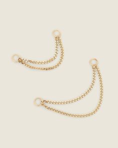 Details: Material: 14k solid gold Chain length options: 19mm and 25mm Sold as a single Does not come with earrings Forward Helix Piercing, Gold Chain Earrings, Barbell Earrings, Chain Earring, Cartilage Earrings Hoop, Flat Back Earrings, 18k Gold Earrings, Solid Gold Chains, Earring Charms