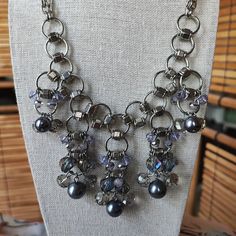 This Listing Is For A Brand New Statement Necklace. It Is Not Signed, But I Believe It To Be Christopher And Banks. The Oversized Chainmail Style Is Shiny Silver, The Faux Pearls Are Gray, Some Of The Crystal Beads Are Smoke, Lavender Are Opaque Pink With Silver Bands. Some Of The Sharper Cut Beads Have An Ab Hue. It Measures Approximately 19", At The Shortest Point, With A 2" Extender. No Tarnishing, No Chips On The Beads, No Peeling Or Flaking On The Pearls. Buy With Confidence, Careful Packaging Promised. I Love To Bundle. Jbag 10 Lavender Necklace, Silver Bands, Chain Mail, Shiny Silver, Black Pearl, Jewelry Silver, Silver Band, Crystal Beads, Womens Jewelry Necklace