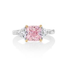 This newly made lag rown diamond ring sets in an elegant three-stone style with two trillion diamonds at 0.6ct. Center stone is 1.79 ct IGI certified lab-grown pink diamond Fancy Light Pink color in cushion cut. The whole ring used 4g 18k white gold and 0.6 ct white diamond in setting (D/E color, vs cut). DM for more details and photos. Classic Pink Gia Certified Diamond Ring, Pink Diamond Cut Diamond Ring, Pink Radiant Cut Diamond Ring Fine Jewelry, Fine Jewelry Pink Radiant Cut Diamond Ring, Pink Radiant Cut Diamond Ring, Pink Diamond Ring With Prong Setting And Radiant Cut, Pink Radiant Cut Diamond Ring With Prong Setting, Pink Radiant Cut Diamond Ring For Anniversary, Pink Marquise Cut Diamond Ring