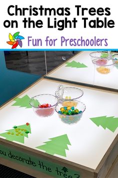 christmas trees on the light table for preschoolers