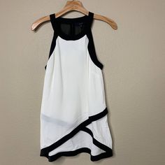 Brand: Eclair Size: Medium Color: White Black Measurements: (If Specific Measurement Is Needed, Please Message Me!) Pit To Pit: 18.5" Length: 28" Condition: New With Tags, Small Spot On Front Ships From Smoke Free Home! Please Email Me With Questions Or Concerns Before Purchasing. White Tank Top For Summer Workwear, White Sleeveless Tank Top For Work, White Vest Top For Night Out, White Tank Top For Workwear, White Tank Top For Work, Chic White Cami Tank Top, White Sleeveless Tank Top For Night Out, Chic White Tank Blouse, Chic White Tank Top For Work