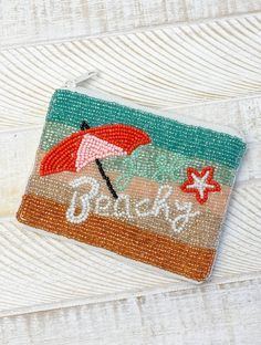 Petite pouch for the beach that’s 5 x 3.5 inches Summer Vacation Beaded Beach Bag, Beaded Beach Bags For Beach Season, Rectangular Beaded Beach Bag, Trendy Beaded Beach Bags, Trendy Summer Beach Pouch, Trendy Beach Pouch For Summer, Rectangular Beach Pouch For Summer, Rectangular Summer Beach Pouch, Multicolor Rectangular Beach Pouch