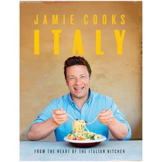 a man holding a fork over a plate with food on it and the cover of his book, l'utalie