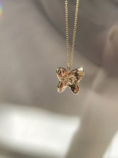 The Papillon is a messenger of angels, a spirit guide leading and guarding you along the way, illuminating your path. The butterfly for me has become a talisman symbolizing hope, renewal, transformation, and new beginnings. Solid 14k yellow gold on 16.5" or 18.5" chain. 🦋 I wanted to carve an illuminated butterfly within the center of the papillon, as a symbol of our own expansion and growth, as a chrysalis who starts the transformation process over and over again, constantly evolving, growing, 14k Yellow Gold Butterfly Pendant Necklace, Gold Spiritual Necklace With Butterfly Charm, Spiritual Gold Necklace With Butterfly Charm, Luxury Gold Butterfly Pendant Necklace, Luxury Yellow Gold Butterfly Pendant Necklace, Luxury Gold Butterfly Charm Necklace, Papillon Butterfly, Constantly Evolving, Spirit Guide