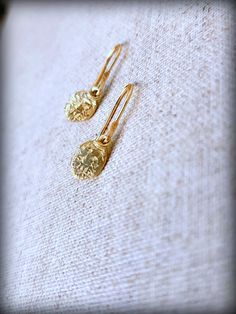 "14k Oval Relic Earrings, Gold Oval Earrings, Gold Oval Earrings, 14k Relic Earrings, Textured Gold Ovals, Gold Dangle Earrings Oval Relic Earrings, a touch of ancient in a modern interpretation of 14k Gold. Dangle from hand shaped and hammered 14k Ear Wires, will fall just below the earlobe. We give our pieces a natural patina, accentuating the details and finish by hand-brushing to impart a matte sheen to the metal, exuding an understated elegance.. Choose Gold or Antiqued Gold finish, with bl Tarnish Resistant Sterling Silver Oval Earrings, Gift Oval Hoop Earrings With Lever Back, 14k Gold Filled Oval Earrings With Ear Wire, Oval Yellow Gold Earrings Gift, Hammered Yellow Gold Oval Earrings, 14k Gold-filled Oval Earrings, Gold Hammered Oval Hoop Earrings, Gold Oval Hammered Hoop Earrings, Yellow Gold Oval Hammered Earrings