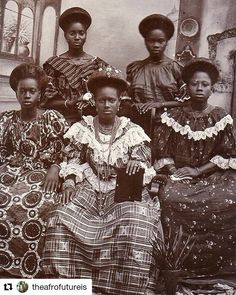 an old black and white photo of four women