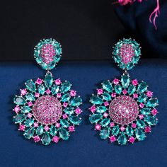 CZ Jewelry- Brand Designer Shiny Rose Red CZ Stone Big Round Flower Statement Dangle Earrings for Women Engagement Party Jewelry E553Model Number:4001006389609 ◆Style: Big Round Flower Statement Dangle Earrings for Women◆Metal Material: Copper (Lead and Nickel free)◆Metal Color: Black Gold◆Stone Material: Cubic Zirconia ◆Stone Color: Hot Pink,Light Blue★Earrings Size: 4 cm Pink Flower-shaped Earrings For Valentine's Day, Rose Red Flower Drop Earrings, Rose Red Flower Shaped Earrings For Party, Rose Red Flower Earrings For Party, Multicolor Flower Shape Jewelry For Party, Multicolor Flower Shape Party Jewelry, Multicolor Party Jewelry With Flower Shape, Pink Flower Drop Earrings For Valentine's Day, Valentine's Day Rose Red Flower Earrings For Party