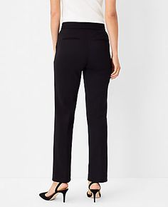 Elevate your wardrobe with the Ann Taylor Petite Pintucked Straight Leg Pant in Double Knit. These pants redefine sophistication with their timeless straight-leg silhouette and classic lean fit, creating a chic, structured look that's perfect for any occasion. The pintucked detailing adds a touch of elegance, making these pants a must-have for the fashion-forward professional.

- Size: Petite 8
- Color: Black
- Material: 78% Polyester, 15% Rayon, 7% Spandex
- Gender: Female
- Fit: Regular fit, l Elegant Stretch Dress Pants Straight Fit, Elegant Stretch Straight Dress Pants, Elegant Straight Stretch Dress Pants, Elegant Tailored Straight Bottoms, Elegant Straight Bottoms For Business Casual, Elegant Straight Pants For Work, Elegant Straight Bottoms, Elegant Black Straight Bottoms, Chic Straight Bottoms For Formal Occasions