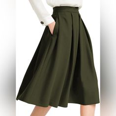 This Is A Very Beautiful Skirt. The Color Is Beautiful. The Material Is Nice. The Shape Of The Skirt Holds Very Well. It Is A Size 12 The Skirt Fits Perfectly, Has A Deep Color, Handy Side Pockets, Matte Twill Fabric. Regular Fit, True To Size. Lined, Superior In Material And Excellent Workmanship, 100% Fiber. Women's Knee-Length Skirt. Twill Fabric For A Comfortable Fit. Pleated And Flared Midi Skirt. You Can Wear The Dance Skirt On Any Occasion: School, Office, Dating, Work And Parties. High W High Waisted Knee Length Skirt, Knee Length Skirt Casual, Green Midi Length Workwear Bottoms, Green Solid Color Skirt For Work, Green Pleated Workwear Skirt With Lining, Green A-line Bottoms For Workwear, Green Flared Skirt For Workwear, Green Flared Skirt For Work, Green Midi Length Bottoms For Fall