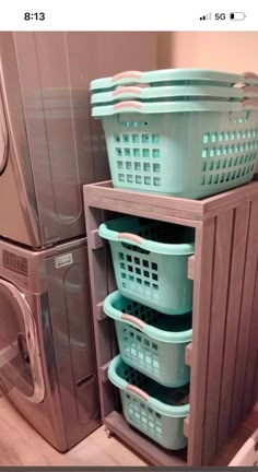 a washer and dryer stacked on top of each other in a laundry room