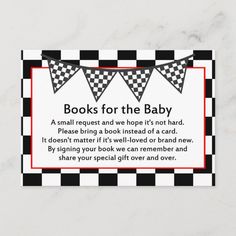 a sign that says books for the baby with black and white checkered flags on it