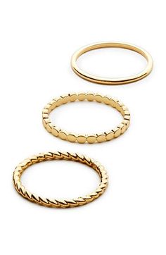 What's better than one gold ring? Three gold rings. This gold ring set is the perfect match between elevated basics and strong layering pieces, with a touch of sparkle. Wear them on the same finger, or mix and match them, they'll look perfect either way. Dipped in 14K gold Features three unique rings Depth: 1.85mm - 0.07” Weight:3.06g Crafted In China Pointer Finger Rings, Everday Rings, Dainty Rings Gold, Women’s Rings, Cute Simple Rings, Index Finger Rings For Women, Trendy Gold Rings, Push Present Ring, Simple Gold Rings