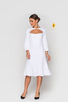 "A knee-length dress featuring a deep neck, mermaid silhouette, 5/6 puffy sleeves, and a concealed side zip closure. - mermaid skirt - deep neck with crystal rhinestone hook & eye closure - knee length (midi) - fitted silhouette - 5/6 puffy raglan sleeves - concealed side zip closure - fully lined Perfect as holiday dress, bridesmaid dress, mother of the bride/mother of the groom or wedding guest dress. Fiber: 55 % viscose, 41% polyamide, 4 % spandex lining : 95% viscose, 5% elastane Color: Cocktail Wedding Guest Dress, Classy Dressing, White Mermaid Dress, Dress Puffy Sleeves, Skater Dresses Casual, Mermaid Midi Dress, White Mermaid, Homecoming Party, Dress Homecoming