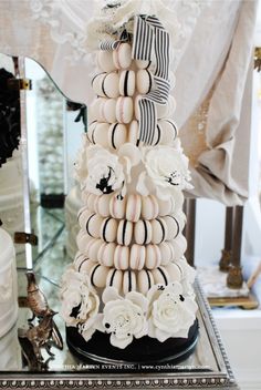 a wedding cake made to look like corn on the cob with black and white stripes