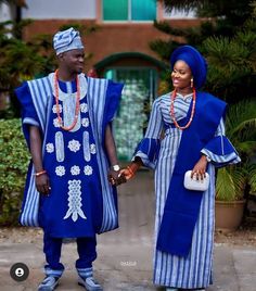 This beautiful attire is made from pure cotton Asooke from the western part of Nigeria, mostly worn to traditional occasions and speak class in all ramification owing to the great sewing techniques and finishing put into it. It is very suitable for a wedding dress and give you that royal and classy look. We can also customize it in any colour of your choice. The female attire consists of 1. wrap Skirt 2. Blouse 3. headgear (or Autogele) 4. shoulder shash...the female attire is slightly embellish Royal Blue Traditional Dress, Indigo Traditional Wedding Sets, Blue Traditional Sets For Ceremonies, Traditional Blue Sets For Ceremonies, Royal Blue Traditional Wear For Ceremonial Occasions, Royal Blue Ceremonial Sets, Blue Traditional Wear With Traditional Patterns In Cotton, Blue Traditional Cotton Wear With Traditional Patterns, Blue Cotton Traditional Wear With Traditional Patterns