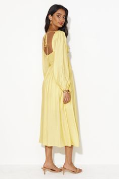 Length from shoulder to hem of size S: 118cm. Chest 37cm, Waist 30cm, size S. Midi dress. Semi-lined. Model is a standard XS and is wearing size XS. True to size. Non-stretch. Elastic back. Puff sleeves. Flowy skirt. Tie-up. Zipper. Cold hand wash only. Polyester/Rayon/Spandex. Feel your absolute best in the Dancing Deni Long Sleeve Midi Dress. Featuring an elastic back, puff sleeves and a flowy skirt. Style with sandals for a gorgeous day 'fit. Yellow Long Sleeve Dress, Dress Date Night, Yellow Midi Dress, Long Bodycon Dress, Jumpsuits And Romper, Dress Yellow, Long Sleeve Lace Dress, Sleeve Midi Dress, Mini Dresses Summer