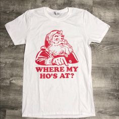 Gildan “Where My Ho’s At” Santa Graphic Tee New Without Tags Size Small 100% Cotton 243 244 White Letter Print Top For Holiday, White Letter Print Tops For Holiday, Casual White T-shirt For Holiday, White Graphic Print Shirt For Holiday, White Graphic Print Top For Holiday, Holiday White T-shirt With Graphic Print, White Graphic Tee For Holidays, White Christmas Tops With Graphic Print, White Christmas Graphic Print Tops