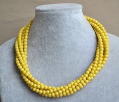 I make the necklace to use 6mm yellow glass pearls.The necklace lengh is 18 inches ,IT has a 2 inches long adjustable chain.IT is good necklace for your great wedding. I can make different type necklace to your requirements,Please feel free to contact me if you have any question. Thank you so much. . Yellow Beaded Pearl Necklace As Gift, Yellow Beaded Pearl Necklace Gift, Yellow Beaded Necklaces With Round Beads For Weddings, Yellow Round Beads Necklace For Wedding, Good Necklace, Necklaces Pearl, Yellow Pearl, Jewelry Bridesmaid, Pearl Necklaces