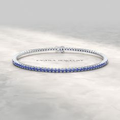 Unveil the captivating brilliance of our exquisite 3.14-carat Natural Blue Sapphire Tennis Bracelet, available in 14K or 18K Solid Gold. Each sapphire showcases an alluring blue hue, illuminating your wrist with unparalleled elegance. As the September birthstone, it symbolizes wisdom and truth, making it a meaningful gift this Thanksgiving. Perfect for layering or as a cherished present for special occasions, this personalized bracelet is a timeless treasure to celebrate gratitude and love. 𝐅𝐞 Luxury Blue Tennis Bracelet, Luxury Blue Diamond Bracelet With Brilliant Cut, Blue Diamond Bracelet With Brilliant Cut Luxury Style, Blue Diamond Wedding Bracelet, Luxury Sapphire Gemstone Tennis Bracelet, White Gold Sapphire Gemstone Tennis Bracelet, Sapphire Tennis Bracelet Fine Jewelry With Prong Setting, Luxury Blue Gemstone Tennis Bracelet, Blue Sapphire Bracelets With Hand Set Details