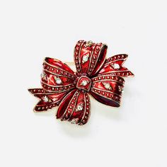 Red rhinestone Christmas bow holiday brooch! Not intended for children ages 13 and under. Also, for many items we can accommodate large orders, so please send us a message. Red Holiday Brooch, Holiday Red Brooch Jewelry, Red Brooch For Valentine's Day Party, Elegant Red Holiday Brooches, Red Christmas Holiday Brooches, Red Christmas Brooch For The Holidays, Red Christmas Brooch For Holidays, Red Christmas Holiday Brooch, Elegant Red Holiday Brooch