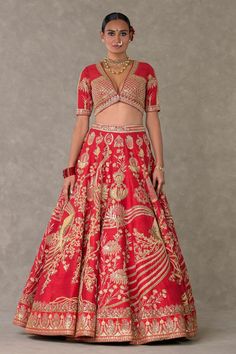 Red lehenga with separate cancan skirt, adorned with Son-chidiya, Haath-phool, Neel-Kamal, Shajara motifs in dori, multicolor thread, sitara, moti kaam work and hemline embellished with embroidered haathphool border and edged with kinari. Paired with embroidered padded blouse and brocade woven dupatta in Haathphool border and anar buti all over.
Components: 4
Pattern: Embellished, Embroidery
Type Of Work: Dori, thread, sitara, moti
Neckline: V neck
Sleeve Type: Half sleeves
Fabric: Lehenga and B Transitional Red Floral Embroidered Sets, Traditional Red Sharara With Floral Embroidery, Anarkali Red Sets With Floral Embroidery, Red Traditional Wear With Floral Embroidery For Transitional Season, Transitional Red Traditional Wear With Floral Embroidery, Red Floral Embroidered Sets For Navratri, Red Sets With Floral Embroidery For Navratri, Red Anarkali Lehenga With Floral Embroidery, Red Sharara With Floral Embroidery For Wedding