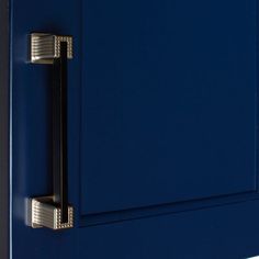 a blue cabinet with two brass handles on the front and back doors, against a white background