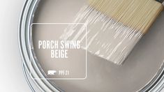 a paint can with a brush in it and the words porch swing bebe painted on it