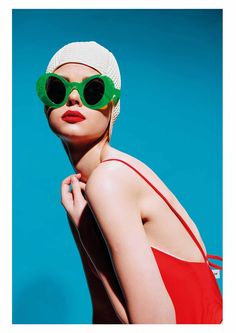 Discover the "Green Sunglass" Poster, a vintage artistic composition that captures the essence of retro fashion with a contemporary twist. This photograph features a stylish woman wearing a red strappy top, retro sunglasses in a bold neon green, and a matching white beanie, creating a unique blend of style and fashion. The "Green Sunglass" Poster evokes timeless aesthetics with a touch of modernity. The fusion of vintage elements and fashionable accessories creates a captivating visual intrigue Cheap Playful Green Sunglasses, Retro Sunglasses For Summer Beach, Retro Green Sunglasses For Parties, Red Retro Sunglasses For Summer, Retro Red Sunglasses For Summer, Retro Green Sunglasses For Party, Retro Sunglasses For Summer Party, Playful Green Sunglasses For Beach, Retro Summer Party Sunglasses