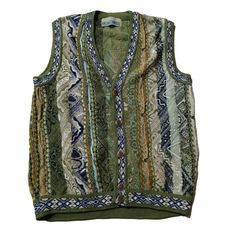 Vintage 90s Coogi Style Cardigan Vest Sleeveless Sweater for men - Classic Retro Knit Dive into the nostalgia of the 90s with this eye-catching vintage Coogi style v cardigan sweater! Inspired by the iconic designs of Coogi Australia, this sweater features the same bold patterns and vibrant colors that defined an era. Perfect for fashion lovers who appreciate unique, statement pieces. Features: Era: 1990s Style: Coogi-inspired Material: High-quality acrylic blend (Soft, warm, and durable) Design 90s Sleeveless Vest For Fall, Vintage Sleeveless Sweater For Winter, Vintage Sleeveless Winter Sweater, Vintage Winter Sweater Vest, Retro Winter Knit Vest, Retro Green Sweater Vest For Winter, Vintage Sleeveless Sweater Vest For Fall, Vintage Green Cotton Vest, Retro Cotton Sleeveless Sweater