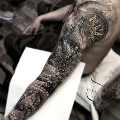 a man with a clock tattoo on his arm